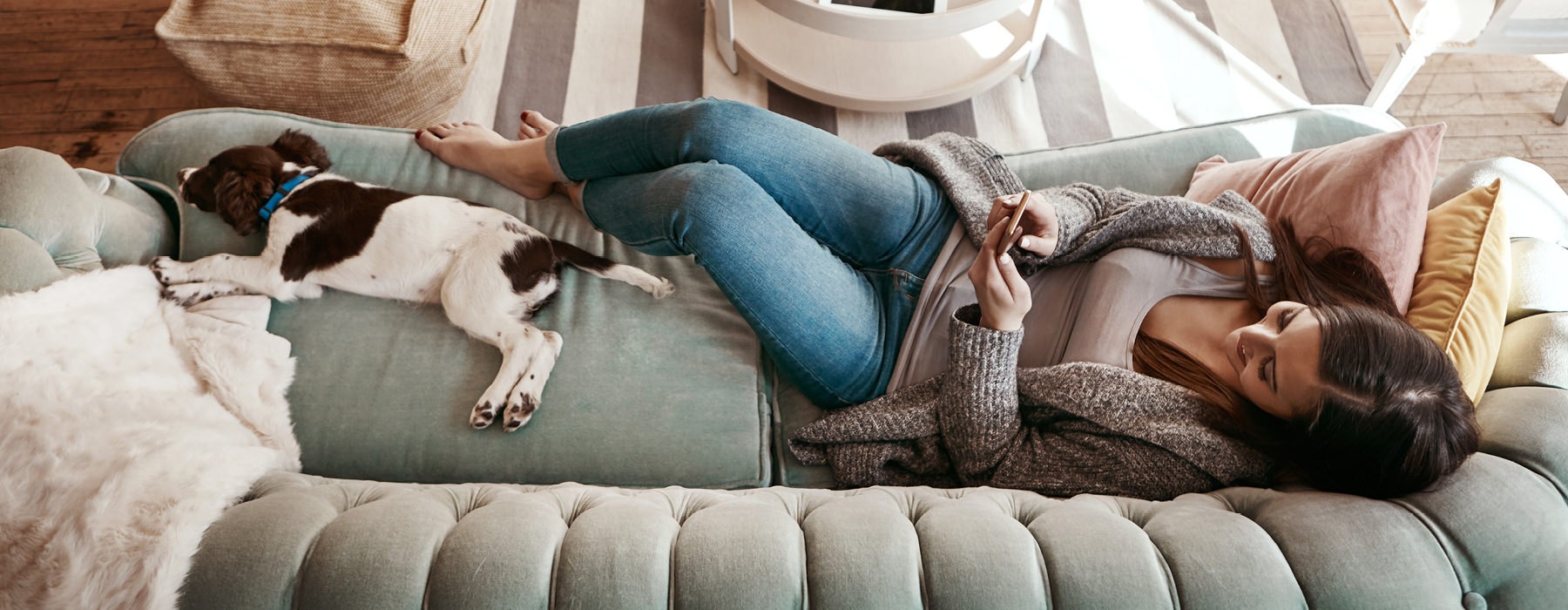 Woman on the sofa with her dog